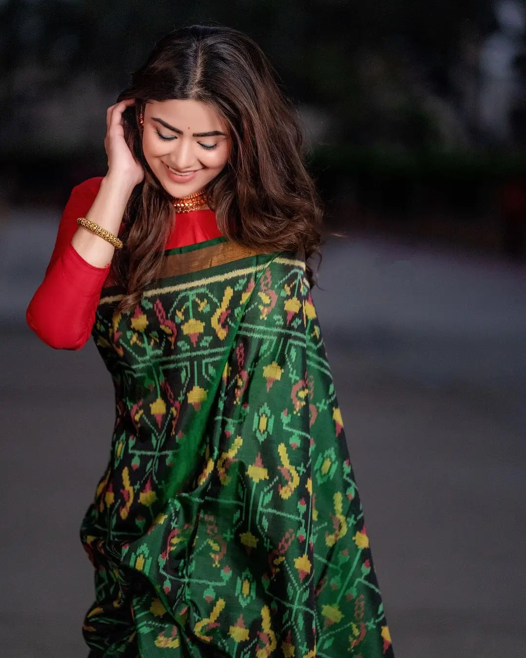 Priyanka Sharma Stills In Green Saree Red Blouse